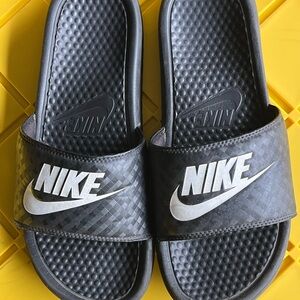Men’s Black Nike Slides
Size 9